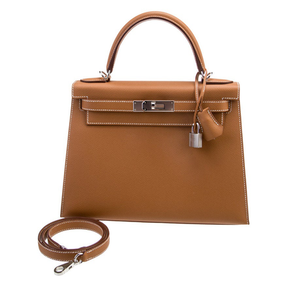 Warm Golden Tan Fine Grain Angular Structured Trapezoid Handbag With Contrast Stitching And Sleek Silvery Twist Lock Hardware