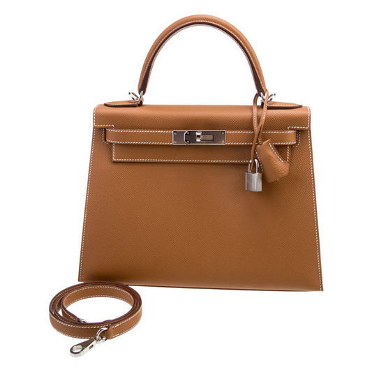 Warm Golden Tan Fine Grain Angular Structured Trapezoid Handbag With Contrast Stitching And Sleek Silvery Twist Lock Hardware
