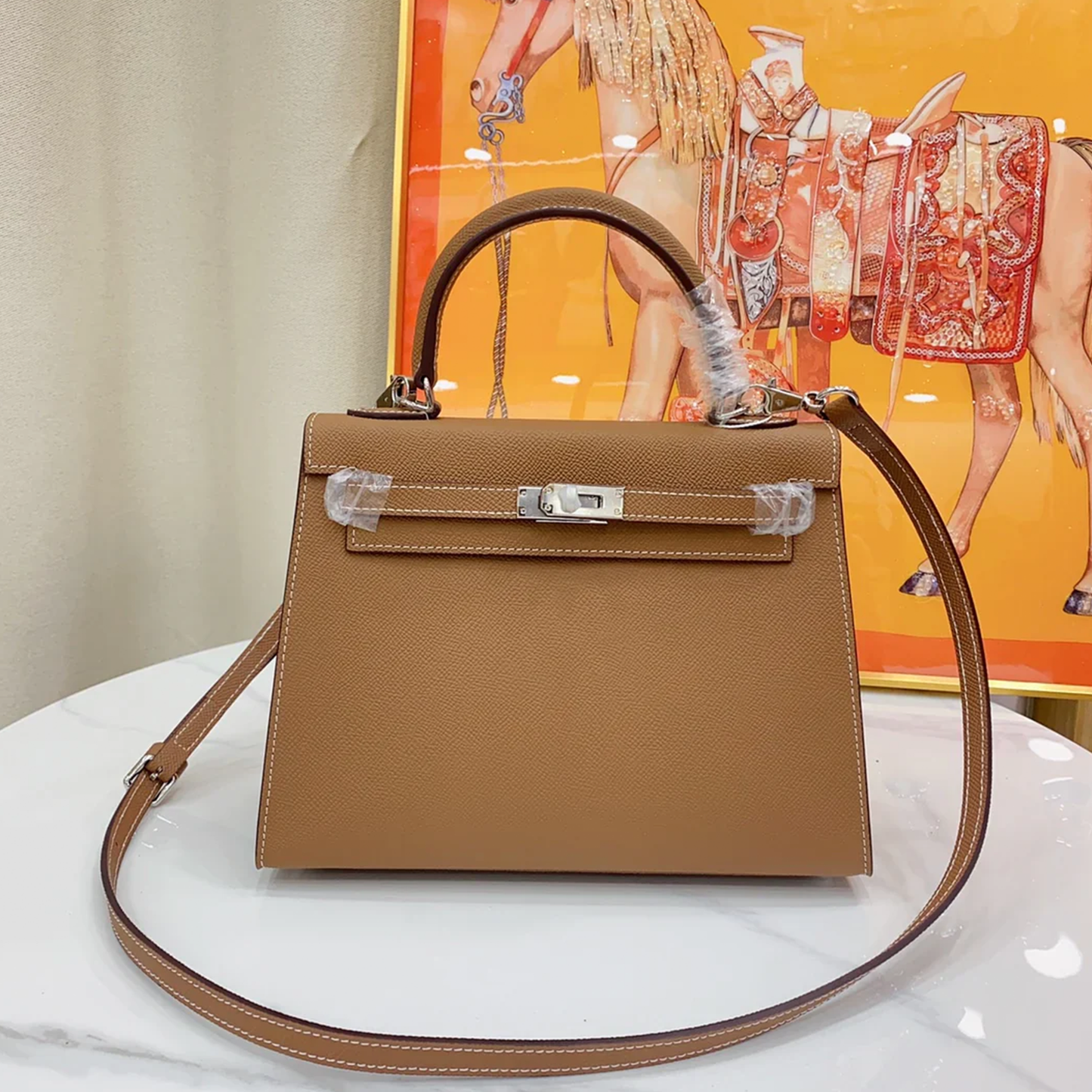 Warm Golden Tan Fine Grain Angular Structured Trapezoid Handbag With Contrast Stitching And Sleek Silvery Twist Lock Hardware
