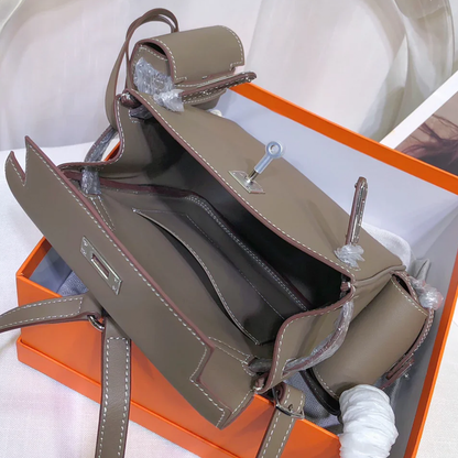 Muted Elephant Grey Vertical Flap Backpack With Pale Contrast Stitching And Side Matching Mini Accessory Pouch